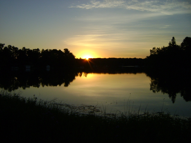 Sunrise over Round & Lime Kiln Lake off County Road Q at Indian Crossing Bridge. 